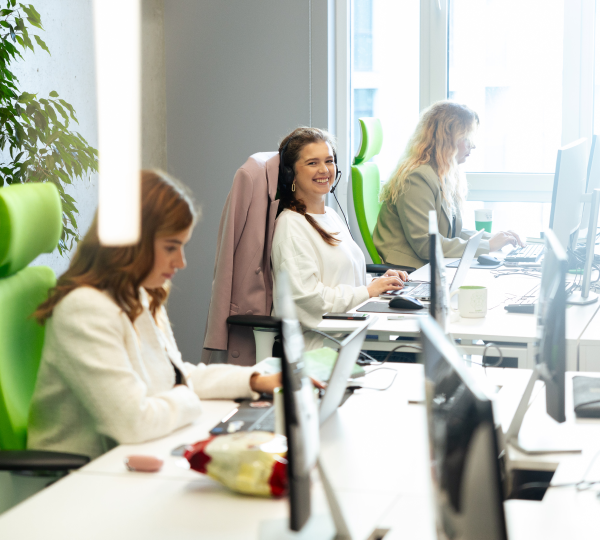 Team members working in Hymux office